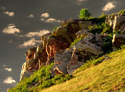 Cliff Across the Road with Receding Storm