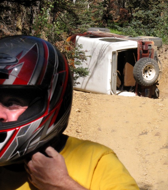 Tipped Jeep with Helpful Motorcycle Guy
